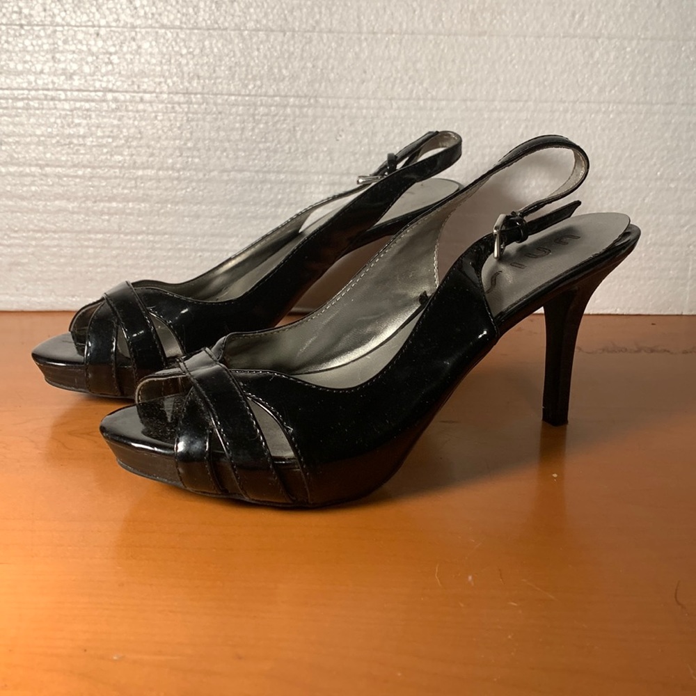 Unisa black patent leather open toe 3” heel. Worn once size 7